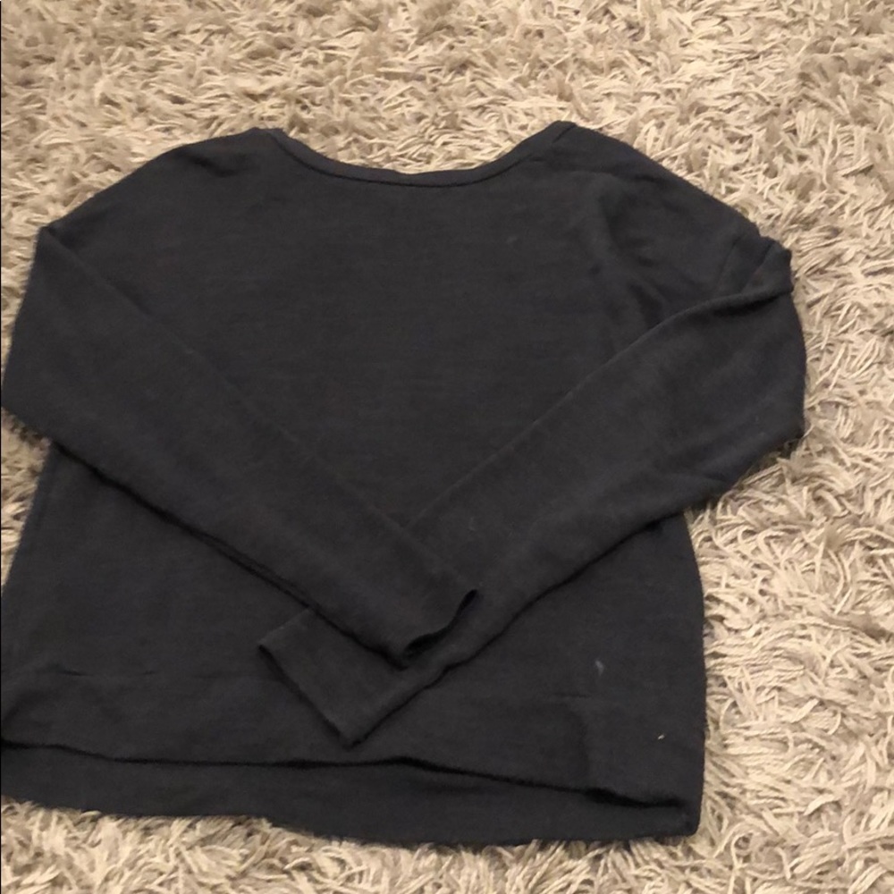 I am selling a gray sweater.